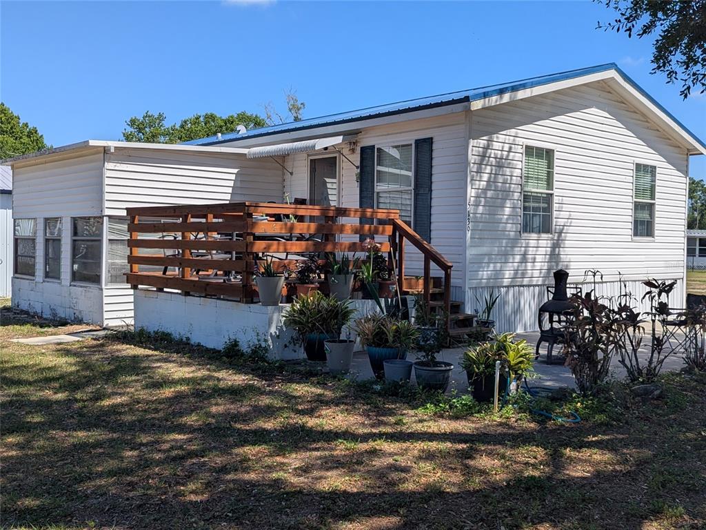 5139 Northeast Sandy Road Arcadia, FL 34266 - Photo 1 of 45 a view of a house with a patio