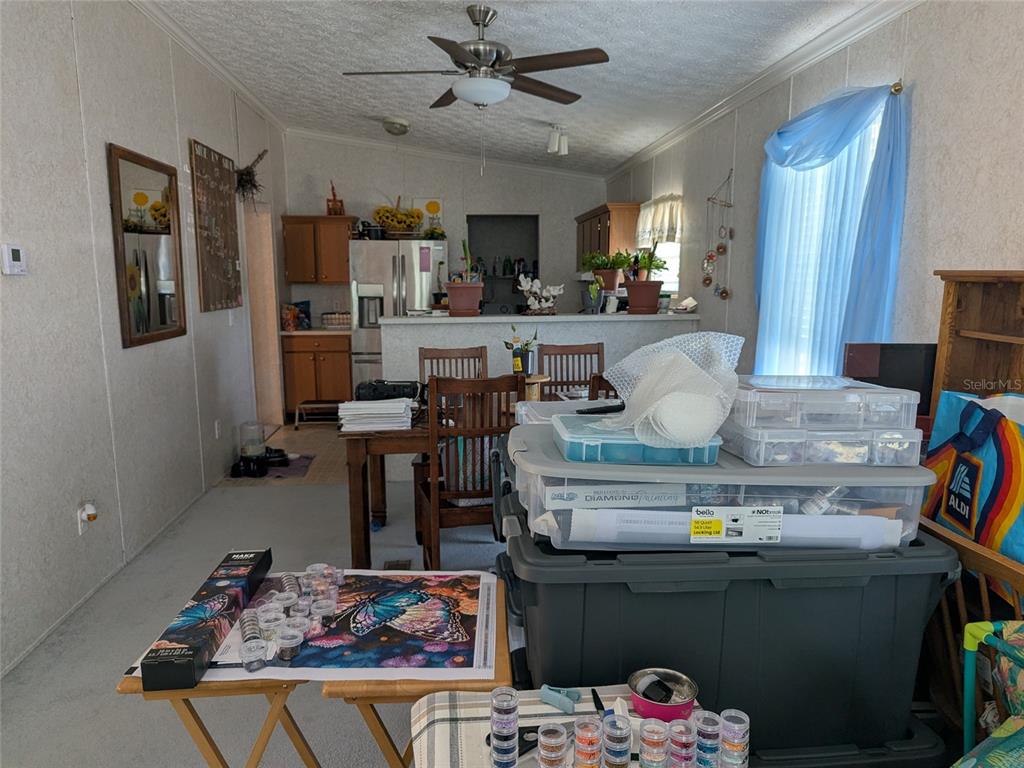 5139 Northeast Sandy Road Arcadia, FL 34266 - Photo 12 of 45 a living room with furniture and a table