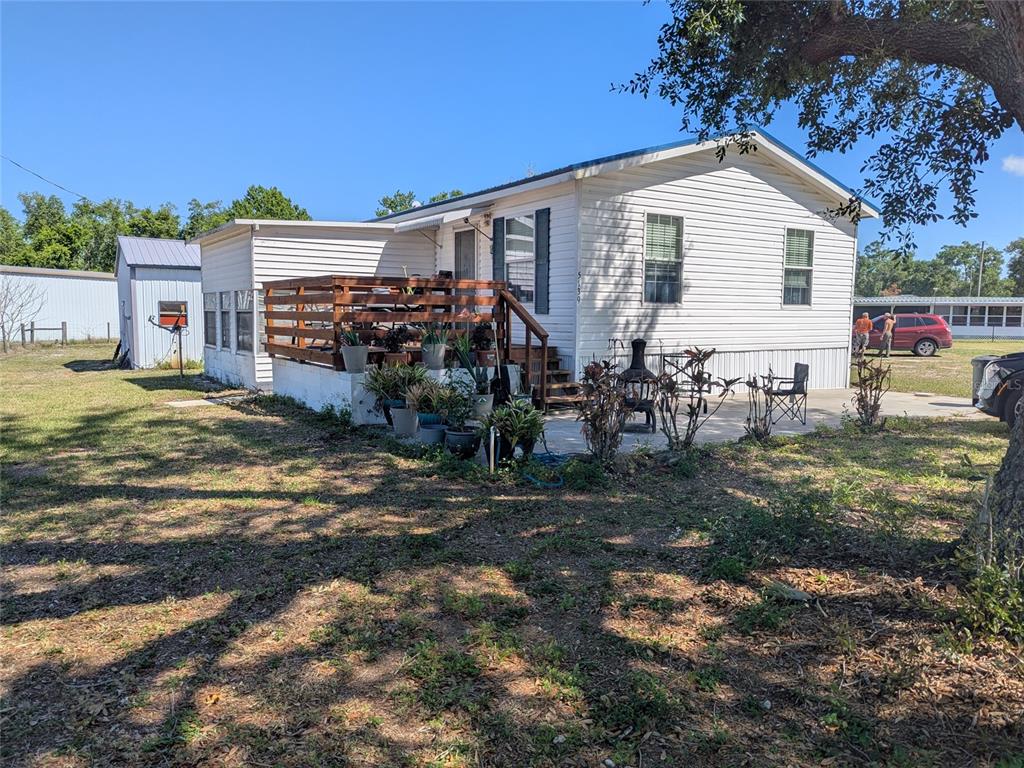 5139 Northeast Sandy Road Arcadia, FL 34266 - Photo 2 of 45 a view of a house with backyard