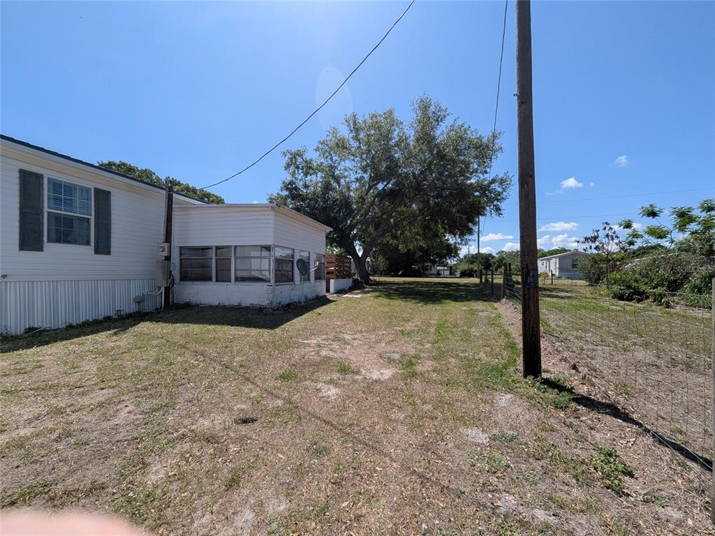 5139 Northeast Sandy Road Arcadia, FL 34266 - Photo 9 of 45 a house view with a backyard space