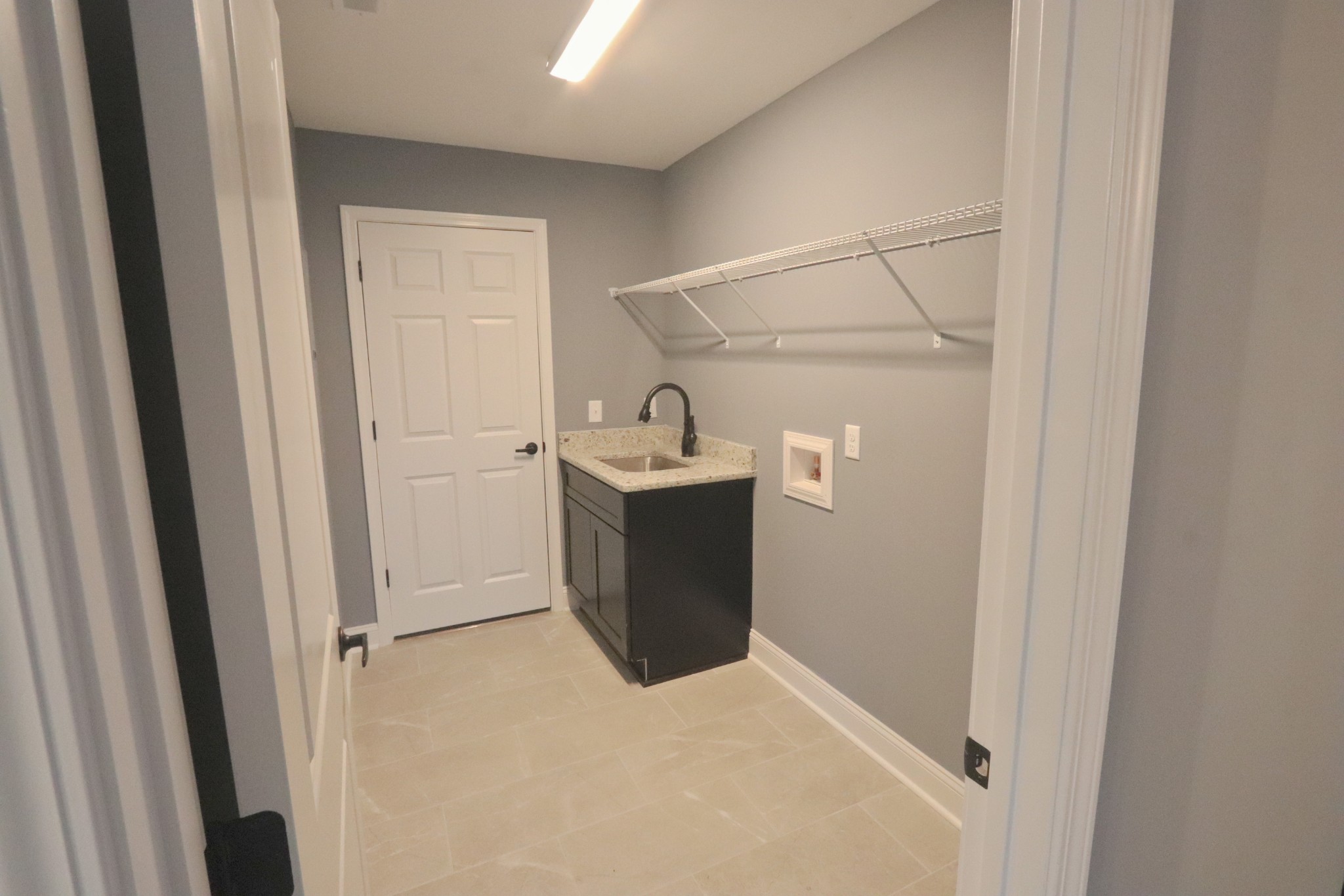 250 Still Point Road Smithville, TN 37166 - Photo 14 of 30 a room with a sink and mirror