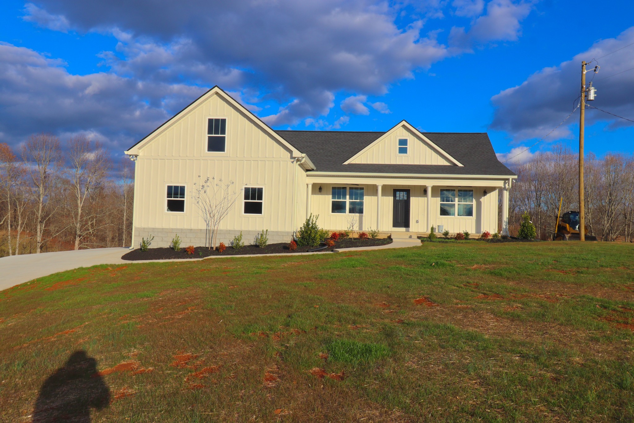 250 Still Point Road Smithville, TN 37166 - Photo 2 of 30 a front view of a house with a garden