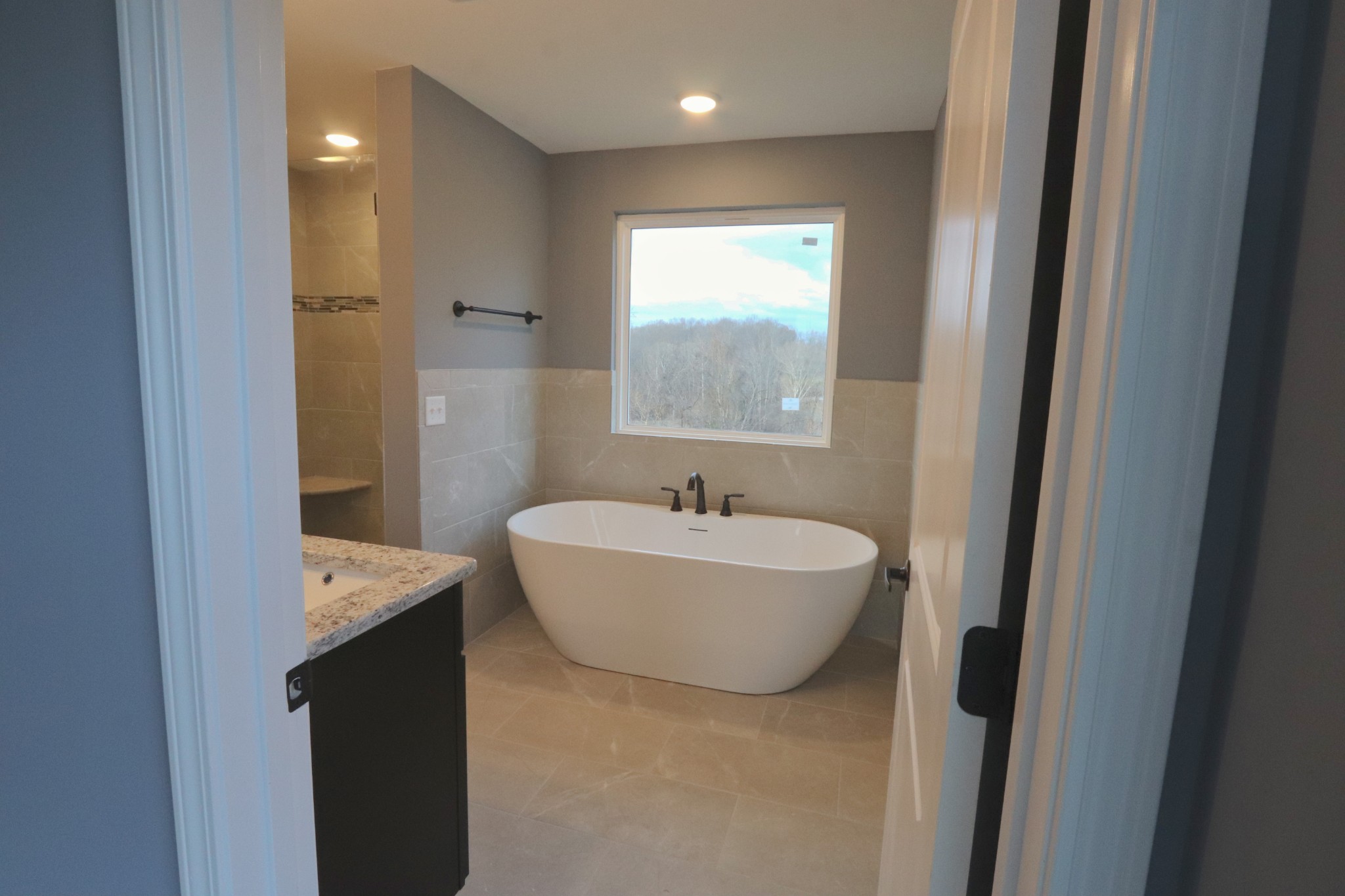 250 Still Point Road Smithville, TN 37166 - Photo 25 of 30 a bathroom with a bathtub and sink