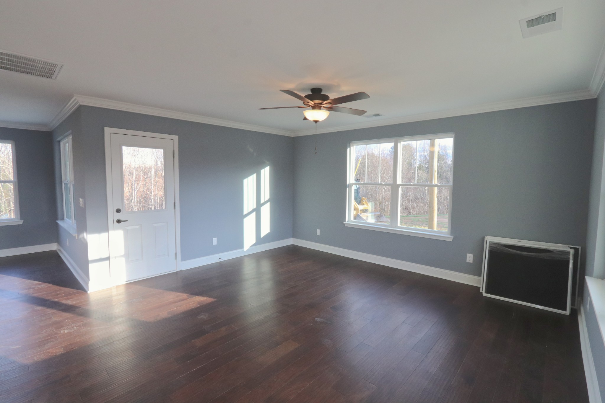 250 Still Point Road Smithville, TN 37166 - Photo 6 of 30 a view of an empty room with wooden floor and a window