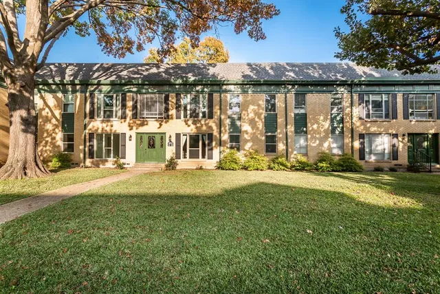 a view of a house with a swimming pool