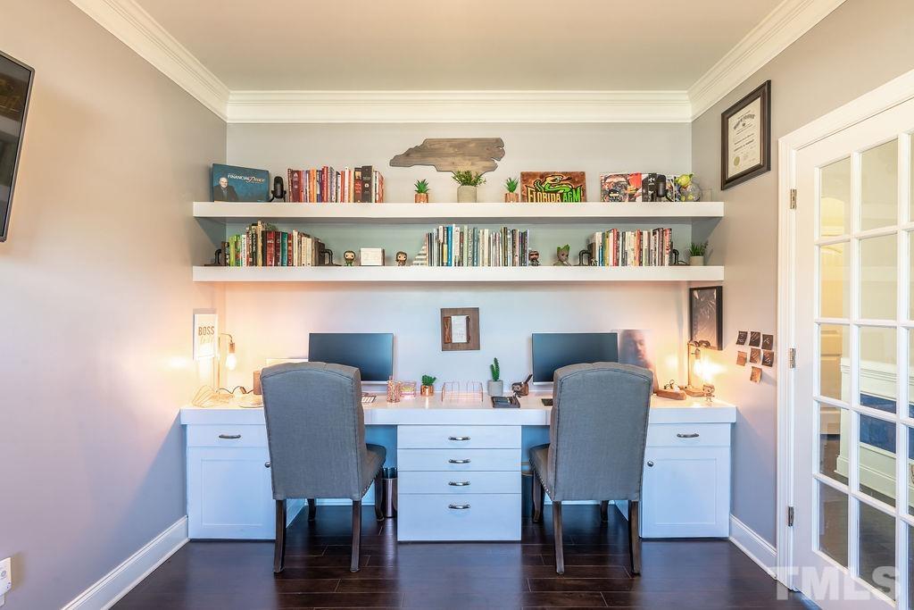 3578 Eastern Branch Road Raleigh, NC 27610 - Photo 12 of 24 a view of a workspace with furniture and wooden floor