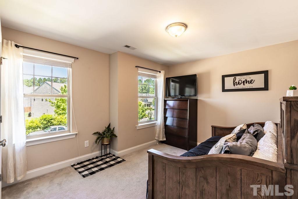 3578 Eastern Branch Road Raleigh, NC 27610 - Photo 18 of 24 a living room with furniture and a window