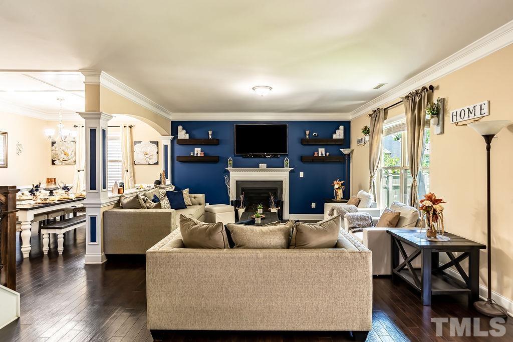 3578 Eastern Branch Road Raleigh, NC 27610 - Photo 3 of 24 a living room with fireplace furniture and a large window