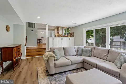 a room that has a bed and a dresser in it