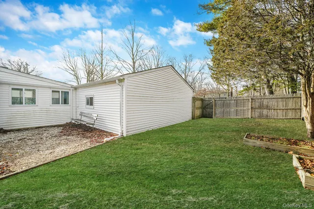 a view of a backyard with a garden