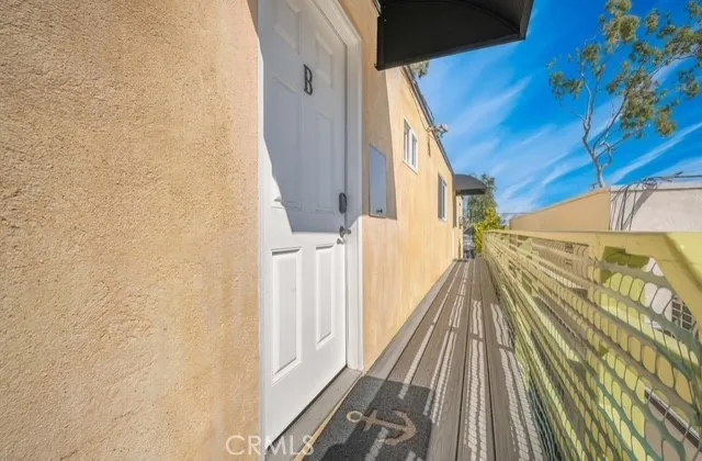a view of balcony with wooden floor