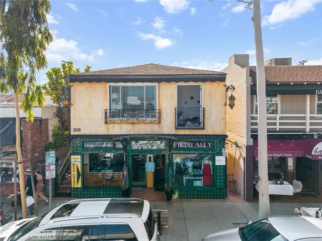 a front view of a building with street view