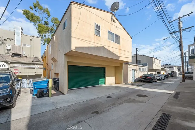 a view of a car park in front of house