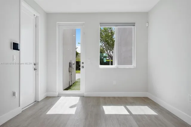 an empty room with windows