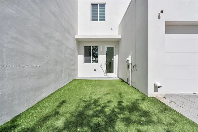 a view of a porch with a yard