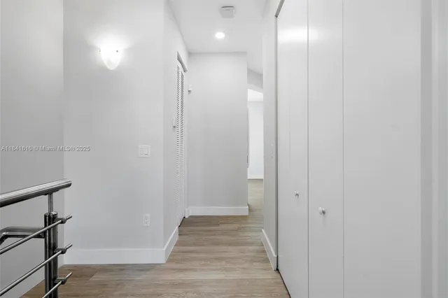 a view of hallway with stairs