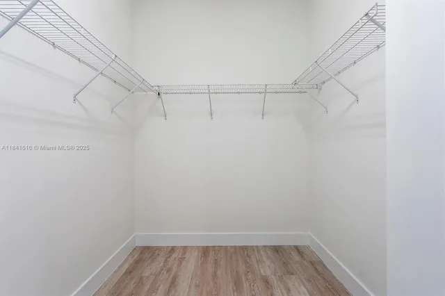 a view of a room with racks on the wall