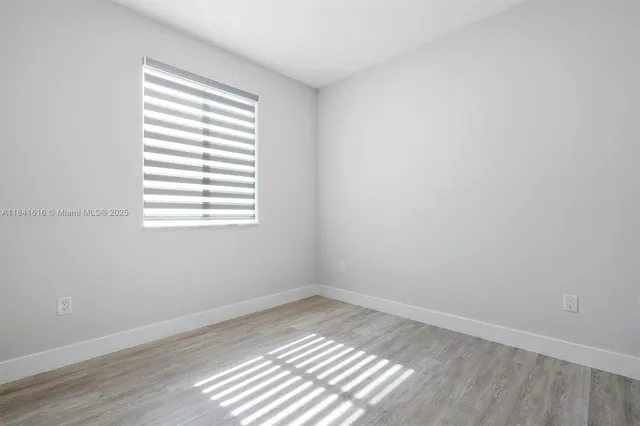 an empty room with a window