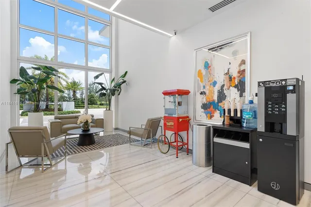 a view of a room with gym equipment and a large window