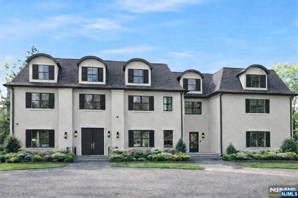 241 East Saddle River Road Saddle River, NJ 07458 - Photo 1 of 48 a front view of residential houses