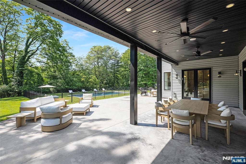 241 East Saddle River Road Saddle River, NJ 07458 - Photo 46 of 48 a outdoor space with patio the couches and pool