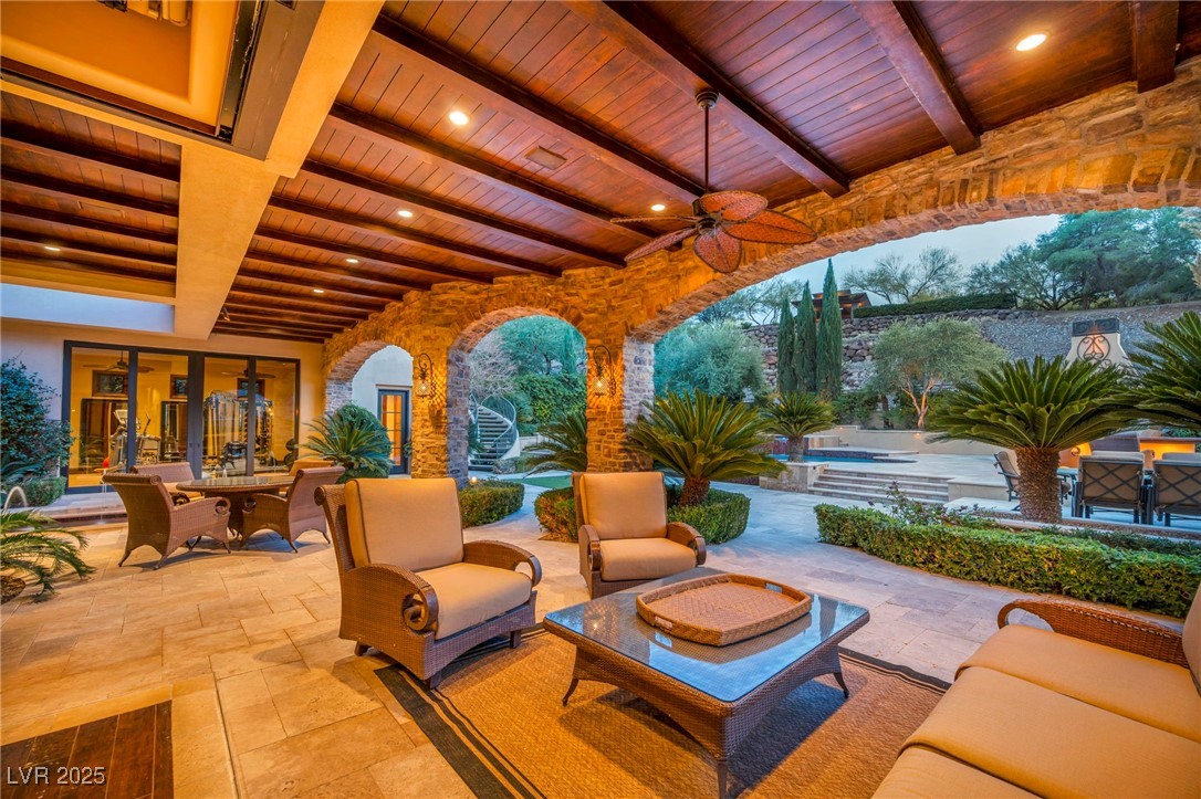 1793 Anelli Court Henderson, NV 89012 - Photo 11 of 47 View of patio / terrace featuring a ceiling fan and outdoor dining space