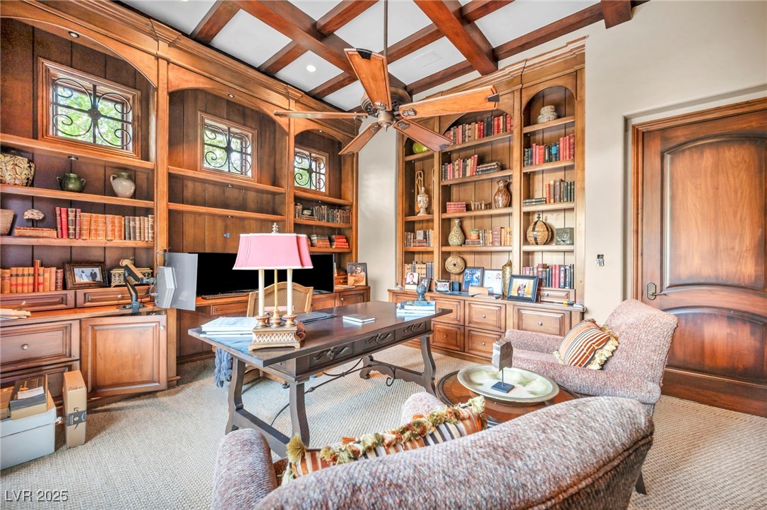 1793 Anelli Court Henderson, NV 89012 - Photo 32 of 47 Office space with built in shelves, coffered ceiling, built in study area, ceiling fan, and beamed ceiling