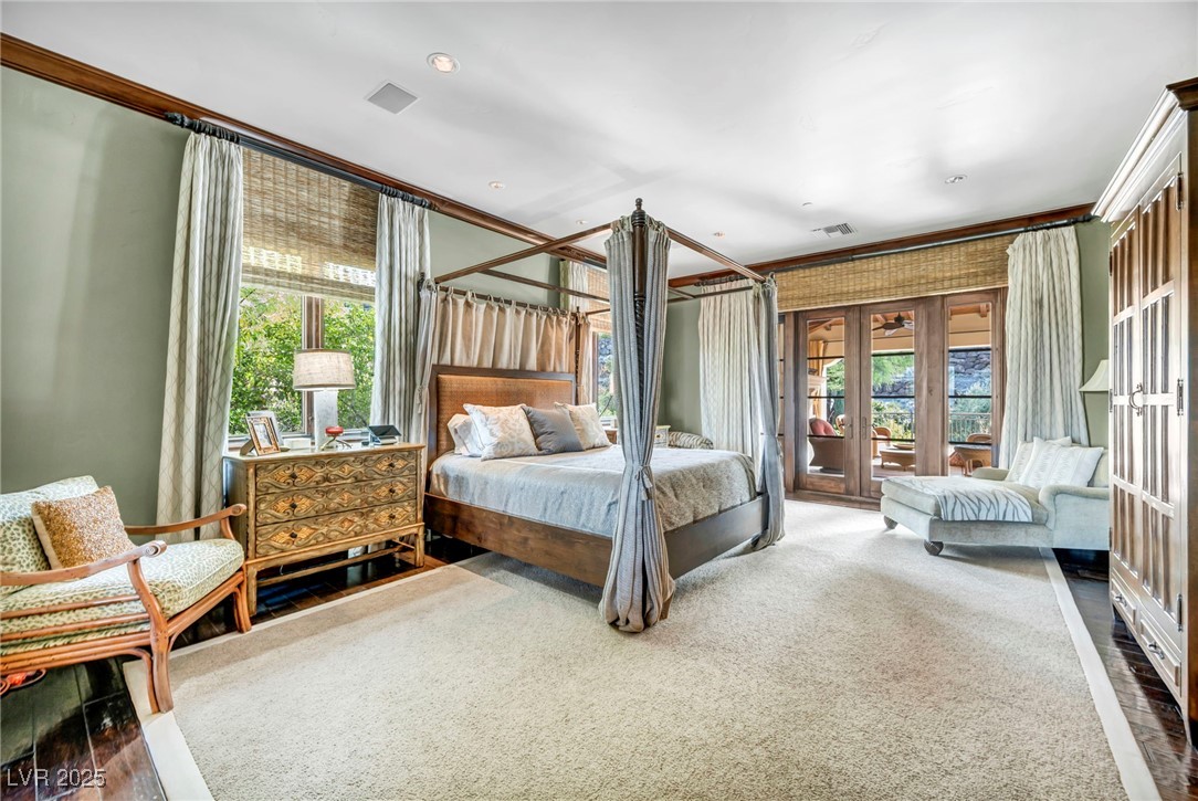 1793 Anelli Court Henderson, NV 89012 - Photo 36 of 47 Bedroom featuring crown molding, access to outside, and carpet floors