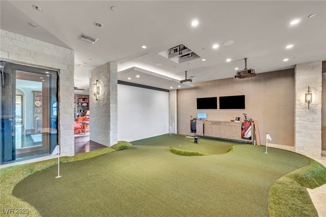 1793 Anelli Court Henderson, NV 89012 - Photo 38 of 47 Playroom with a putting green, golf simulator, and recessed lighting