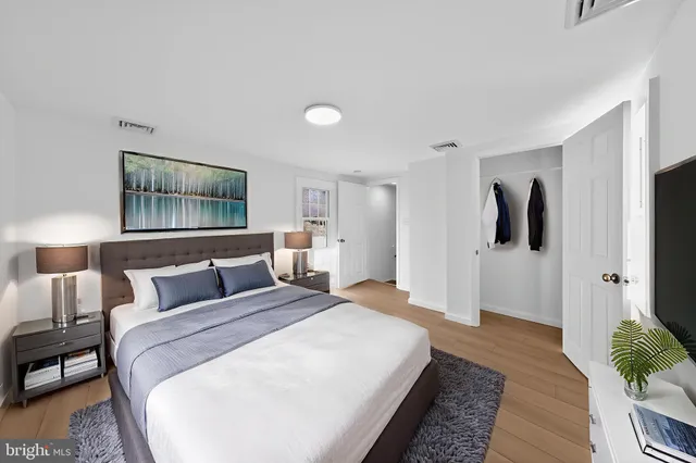 a white bath tub sitting in a bathroom