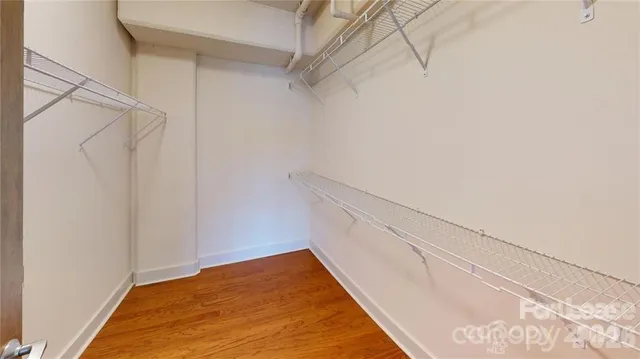 a view of small space with racks on the wall