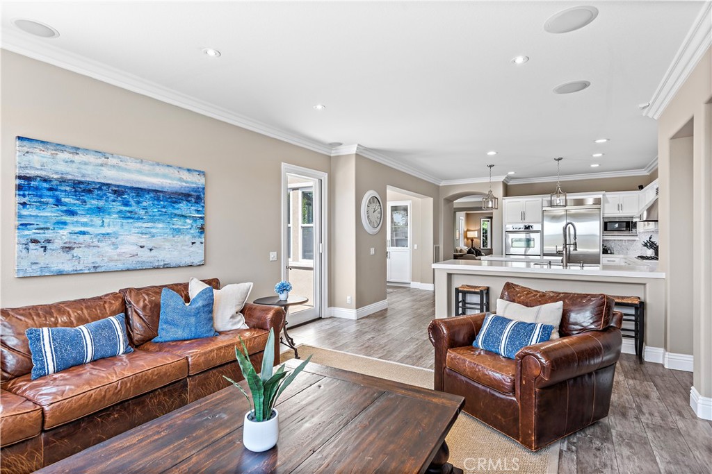 10 Blue Spruce Drive Ladera Ranch, CA 92694 - Photo 19 of 45 a living room with furniture and a kitchen view