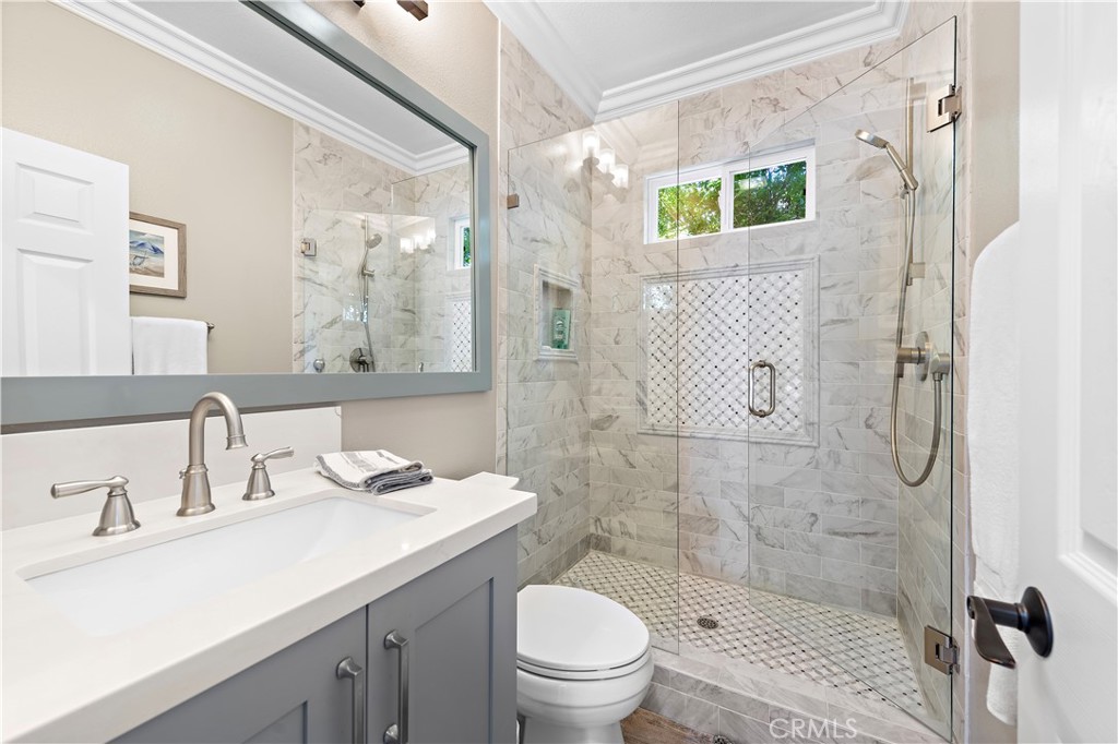 10 Blue Spruce Drive Ladera Ranch, CA 92694 - Photo 33 of 45 a bathroom with a sink toilet and shower