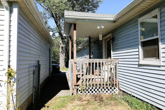 a view of a porch with a chair