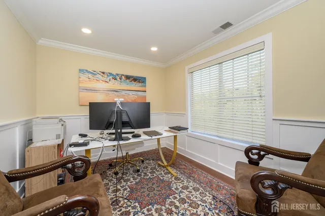 a workspace with furniture and a window