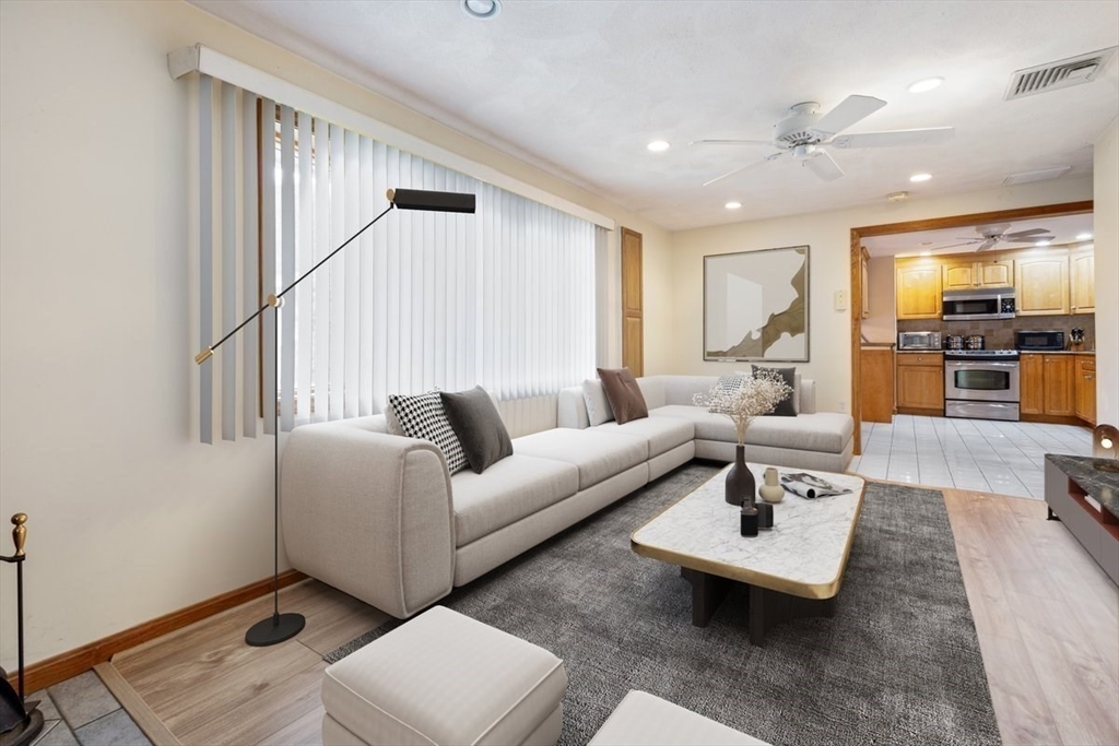 6 Sycamore Street Danvers, MA 01923 - Photo 13 of 30 a living room with furniture and wooden floor