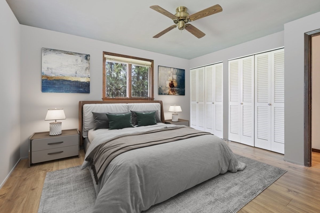 6 Sycamore Street Danvers, MA 01923 - Photo 16 of 30 a bedroom with a large bed and a window