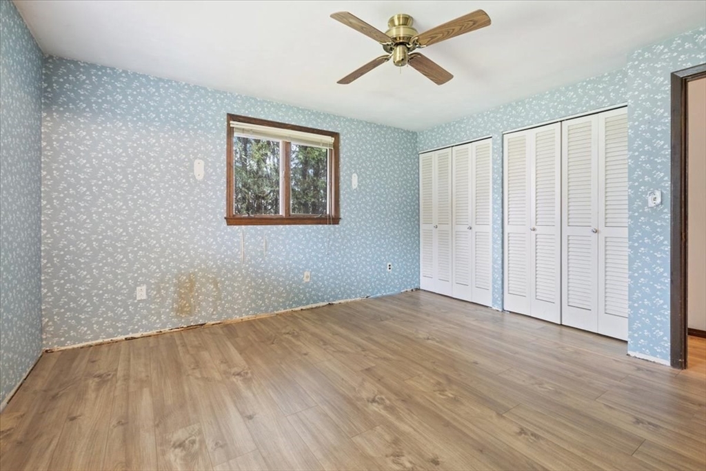 6 Sycamore Street Danvers, MA 01923 - Photo 17 of 30 a view of an empty room with wooden floor