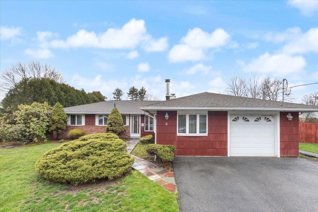 6 Sycamore Street Danvers, MA 01923 - Photo 2 of 30 a front view of a house with a yard
