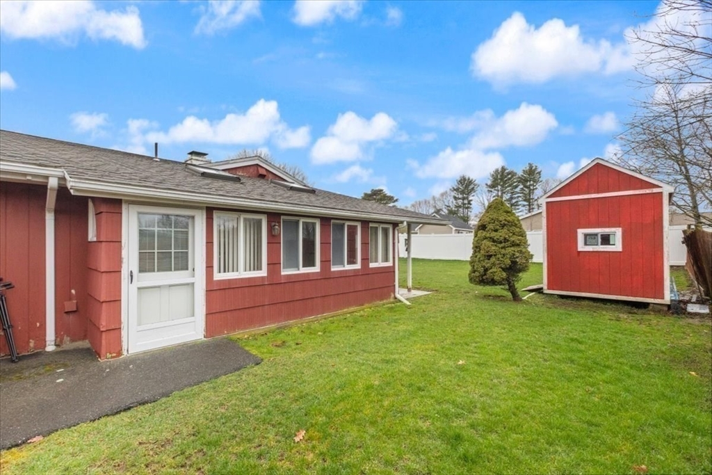 6 Sycamore Street Danvers, MA 01923 - Photo 28 of 30 a view of a house with a yard