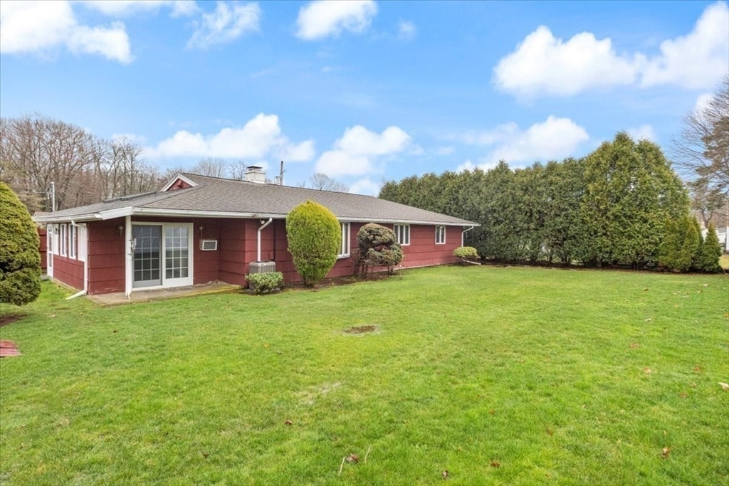 6 Sycamore Street Danvers, MA 01923 - Photo 29 of 30 front view of a house with a garden