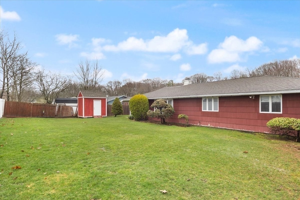 6 Sycamore Street Danvers, MA 01923 - Photo 30 of 30 a view of a house with a yard