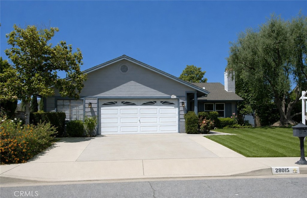 28015 Tupelo Ridge Drive Valencia, CA 91354 - Photo 1 of 41 Digitally enhanced, sod at right of driveway in lieu of stepping stones