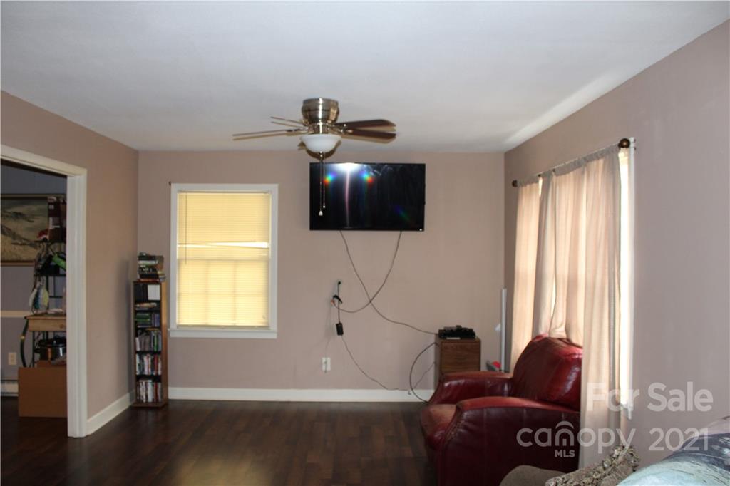 1021 Faith Road Salisbury, NC 28146 - Photo 3 of 12 a living room with furniture and a window
