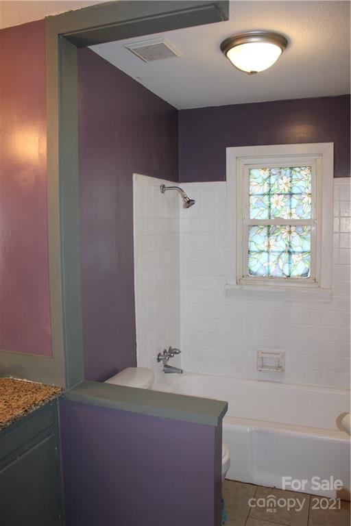 1021 Faith Road Salisbury, NC 28146 - Photo 9 of 12 a bathroom with a sink and a mirror