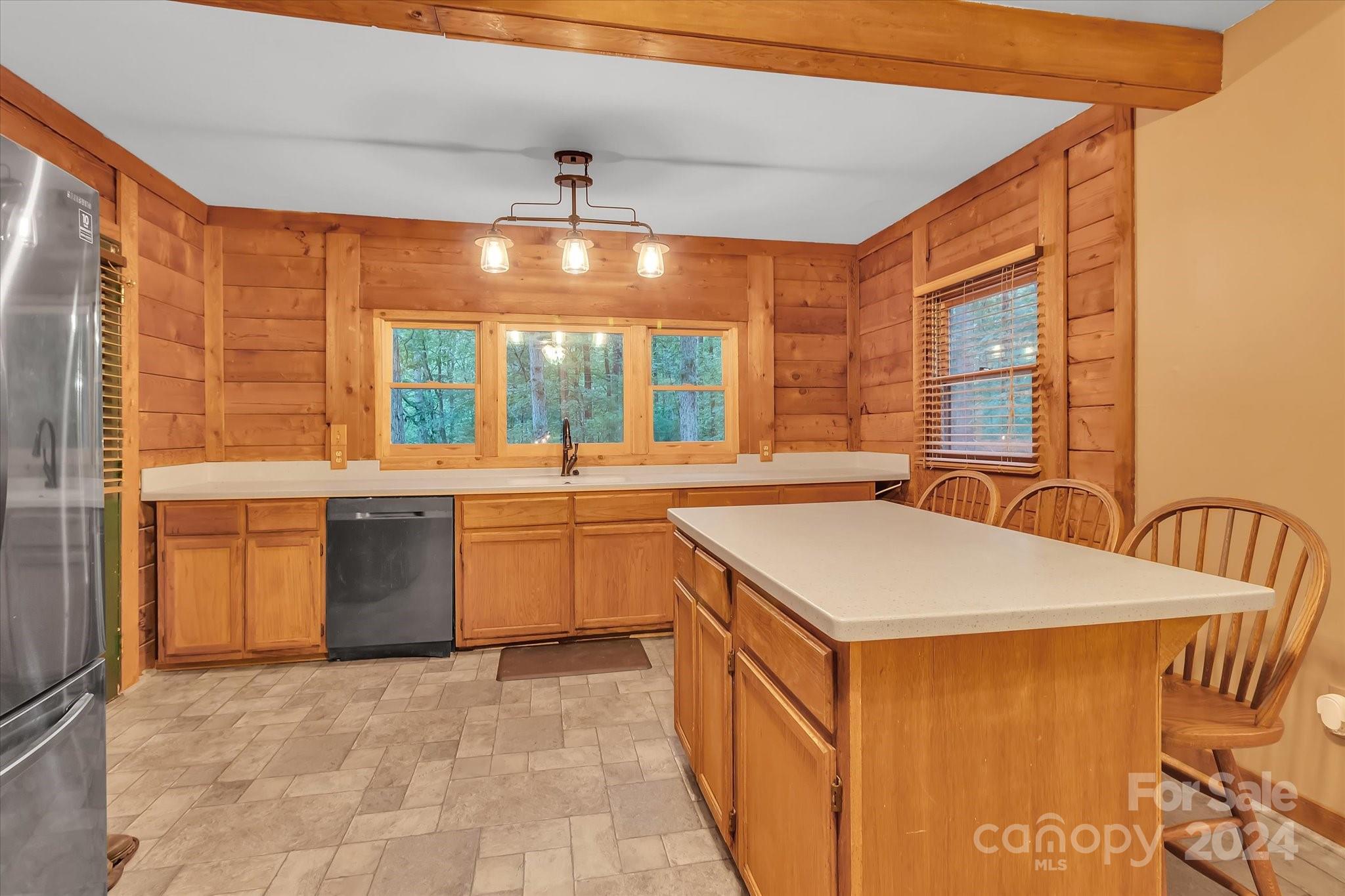 824 Rutledge Drive Catawba, SC 29704 - Photo 14 of 25 a kitchen with a sink and large windows