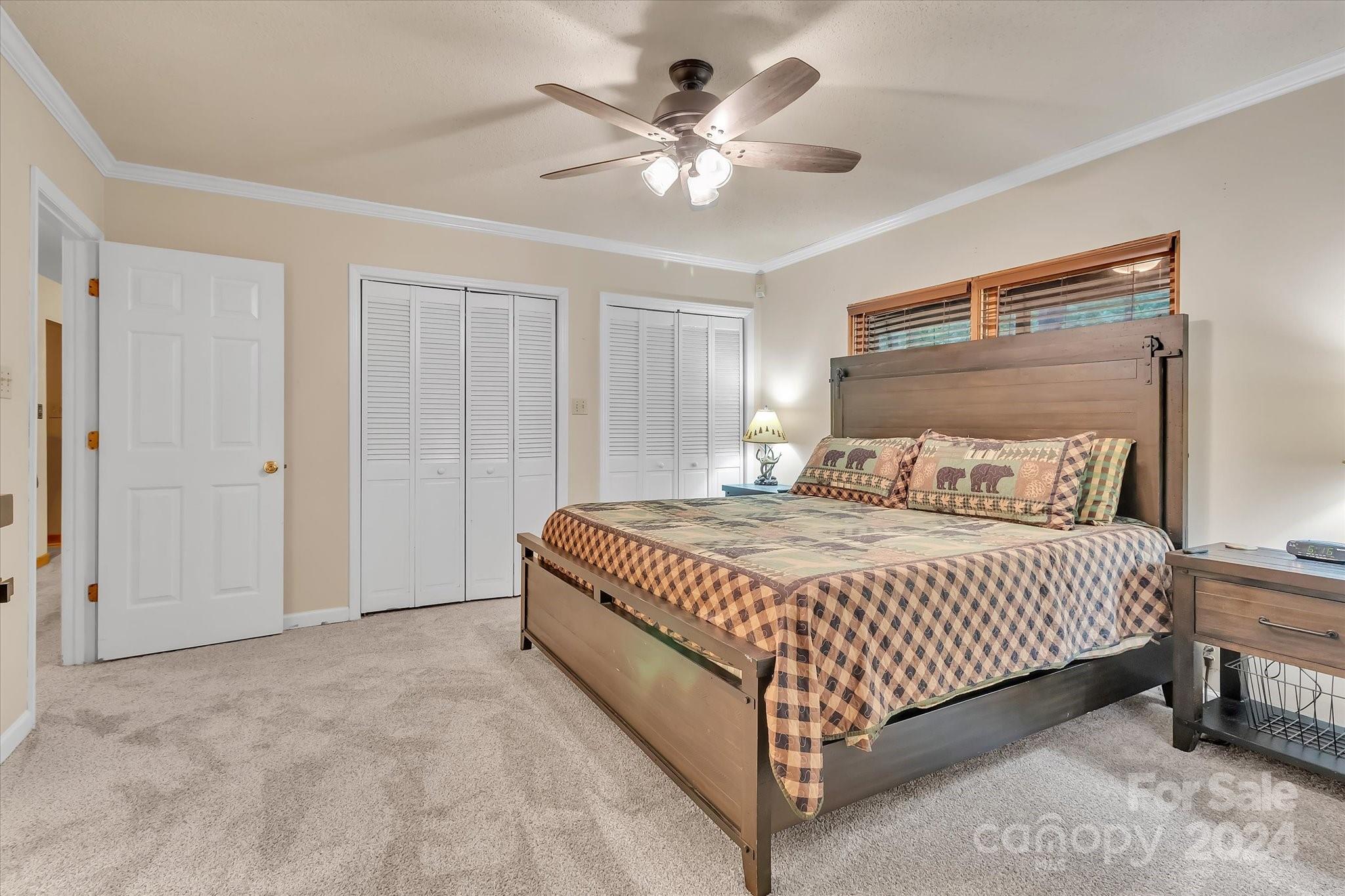 824 Rutledge Drive Catawba, SC 29704 - Photo 16 of 25 a spacious bedroom with a bed and a ceiling fan