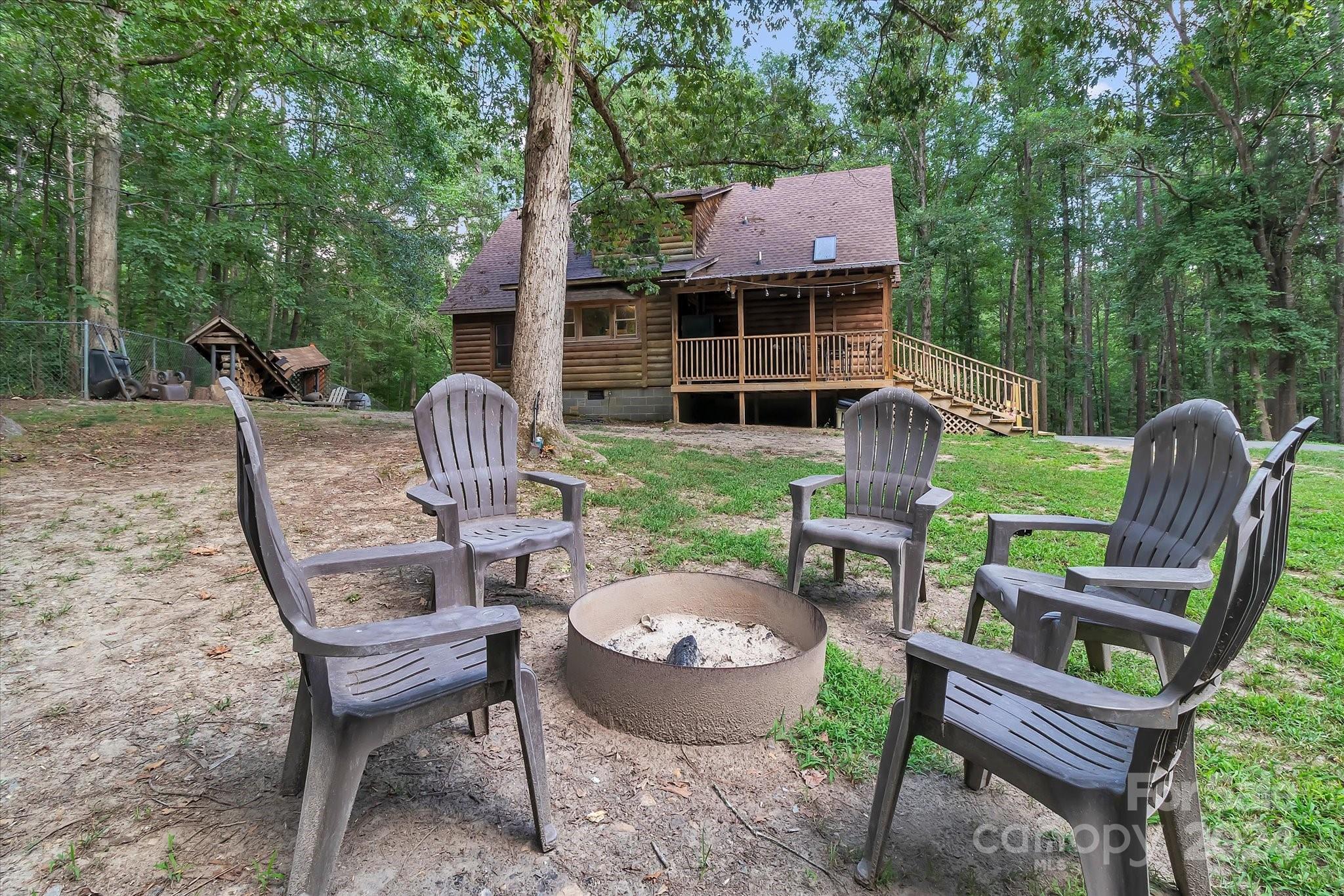 824 Rutledge Drive Catawba, SC 29704 - Photo 24 of 25 a view of a chairs and table in backyard