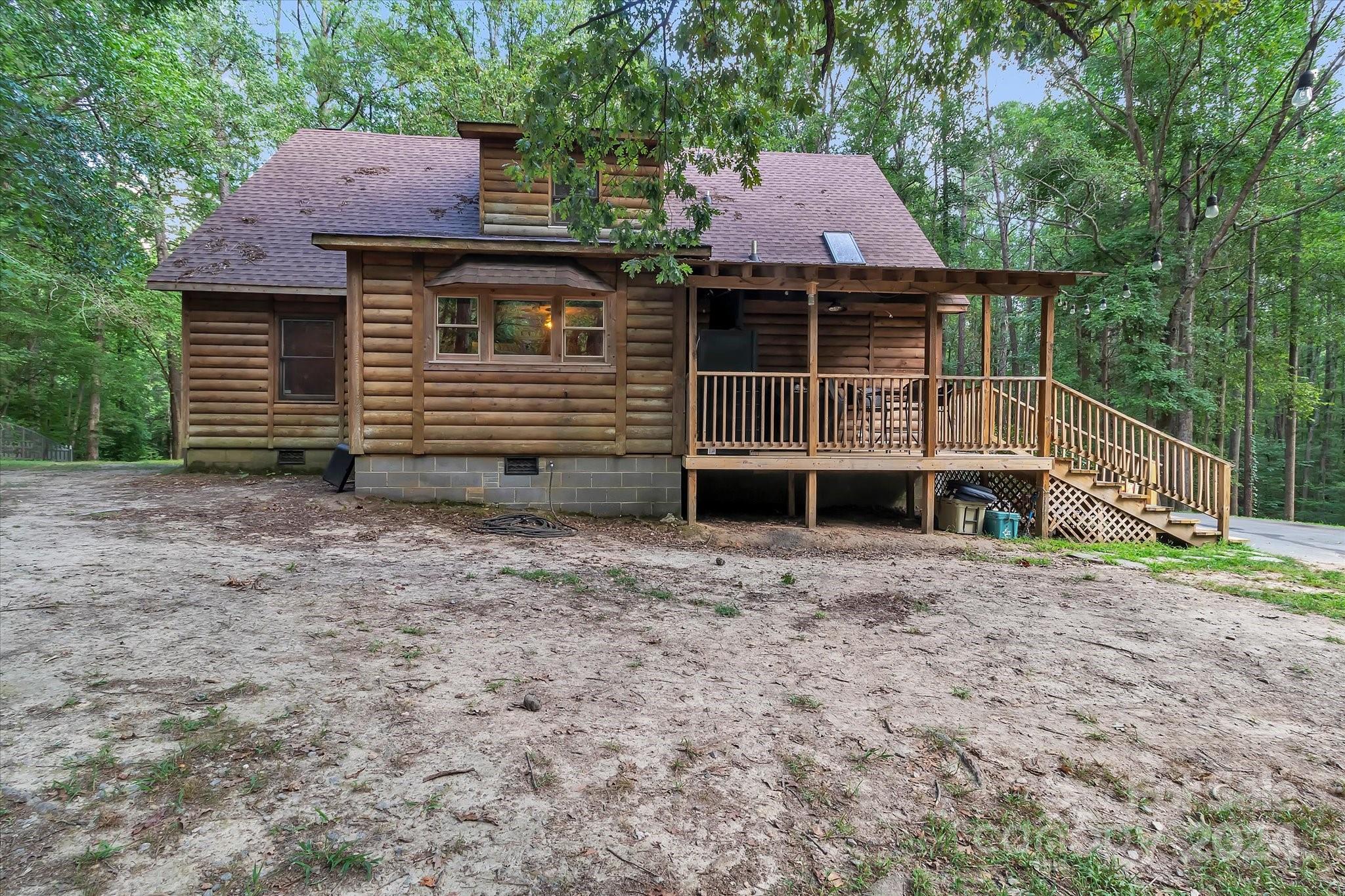 824 Rutledge Drive Catawba, SC 29704 - Photo 5 of 25 a front view of a house with a garden