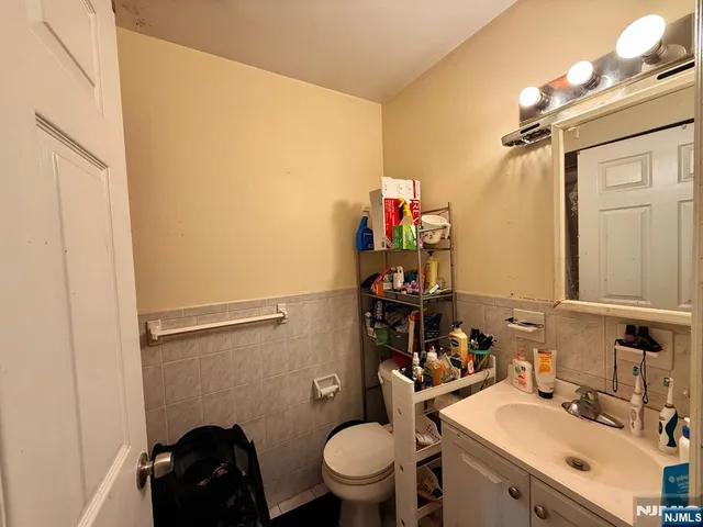 a bathroom with a sink and a toilet